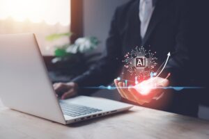 ai hologram in hand laptop