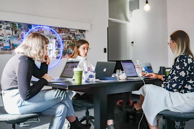 Team reviewing campaign messaging before launching paid ads